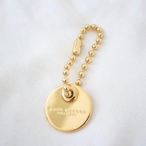Marc Jacobs Gold Bag Charm